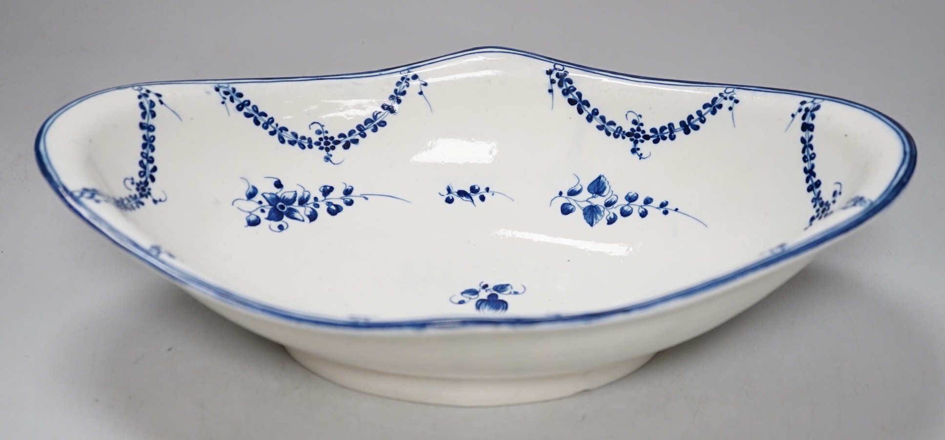An 18th century Caughley rare Pineapple Dish painted with the Dessert Festoons pattern, 32cms wide